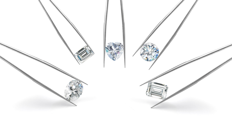 Eine Gruppe von Pinzetten mit unterschiedlich geformten Diamanten